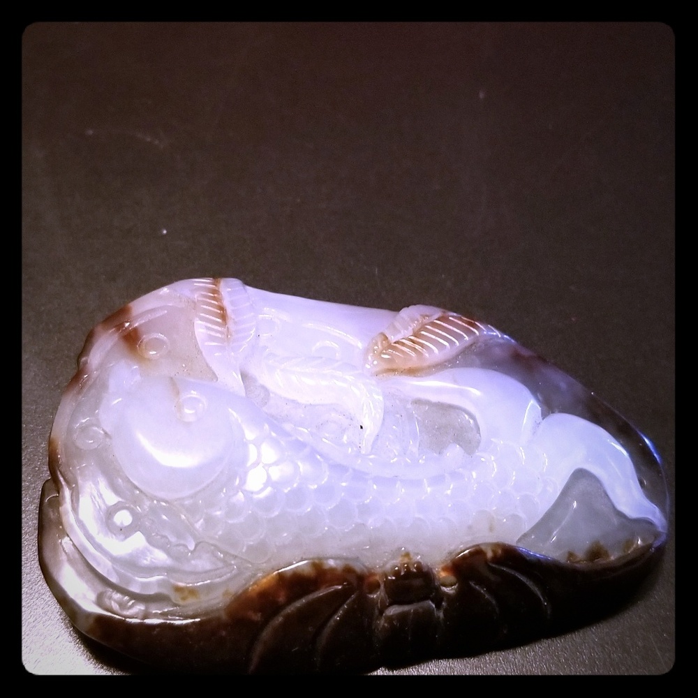 Hand carved jade pendant